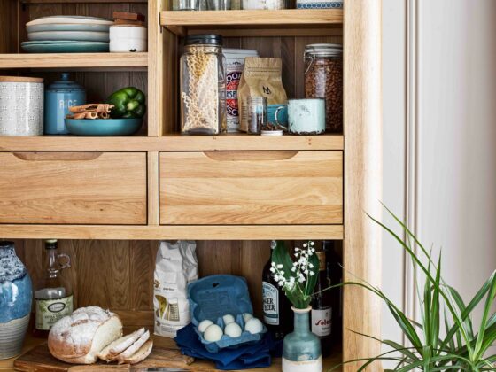 Romsey dresser filled with glass jars, recipe books and decorative objects.