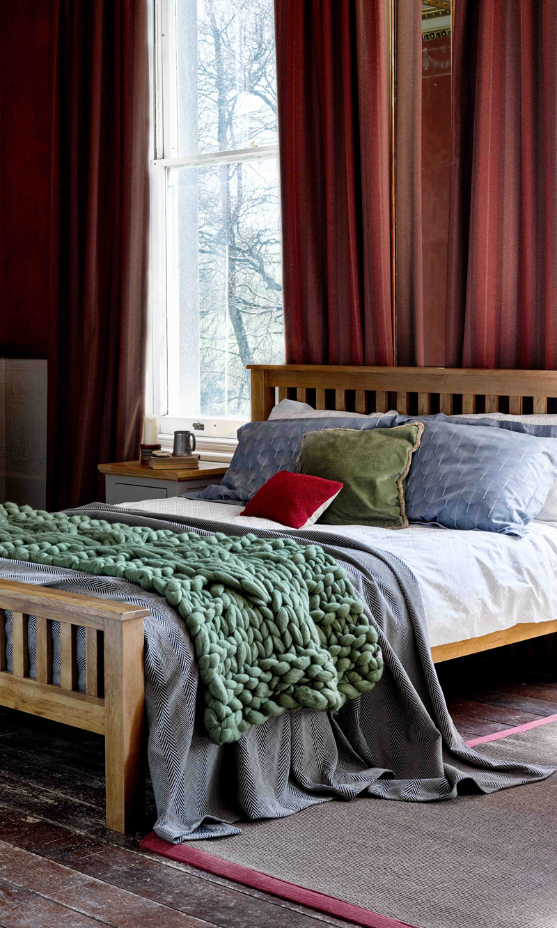 Bed with red Curtains