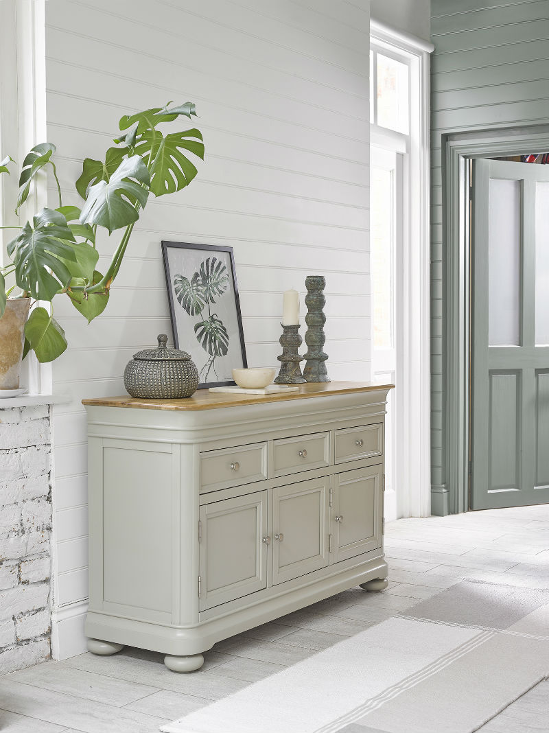 sage green painted sideboard in urban kitchen