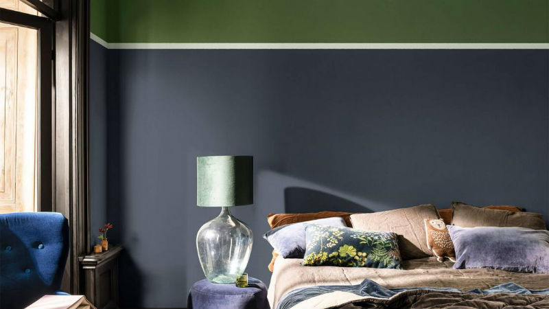 grey and green themed bedroom with blue accessories