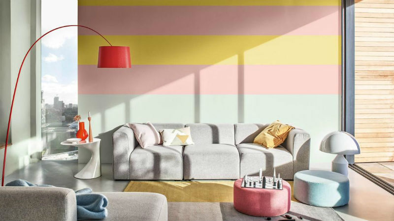 living room with multicoloured striped feature wall