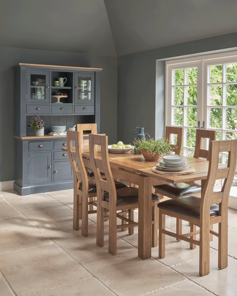 blue painted dresser with contrasting oak dining table
