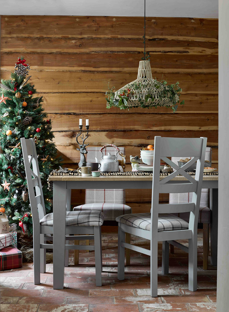 Grey-painted dining set in a Christmas scene