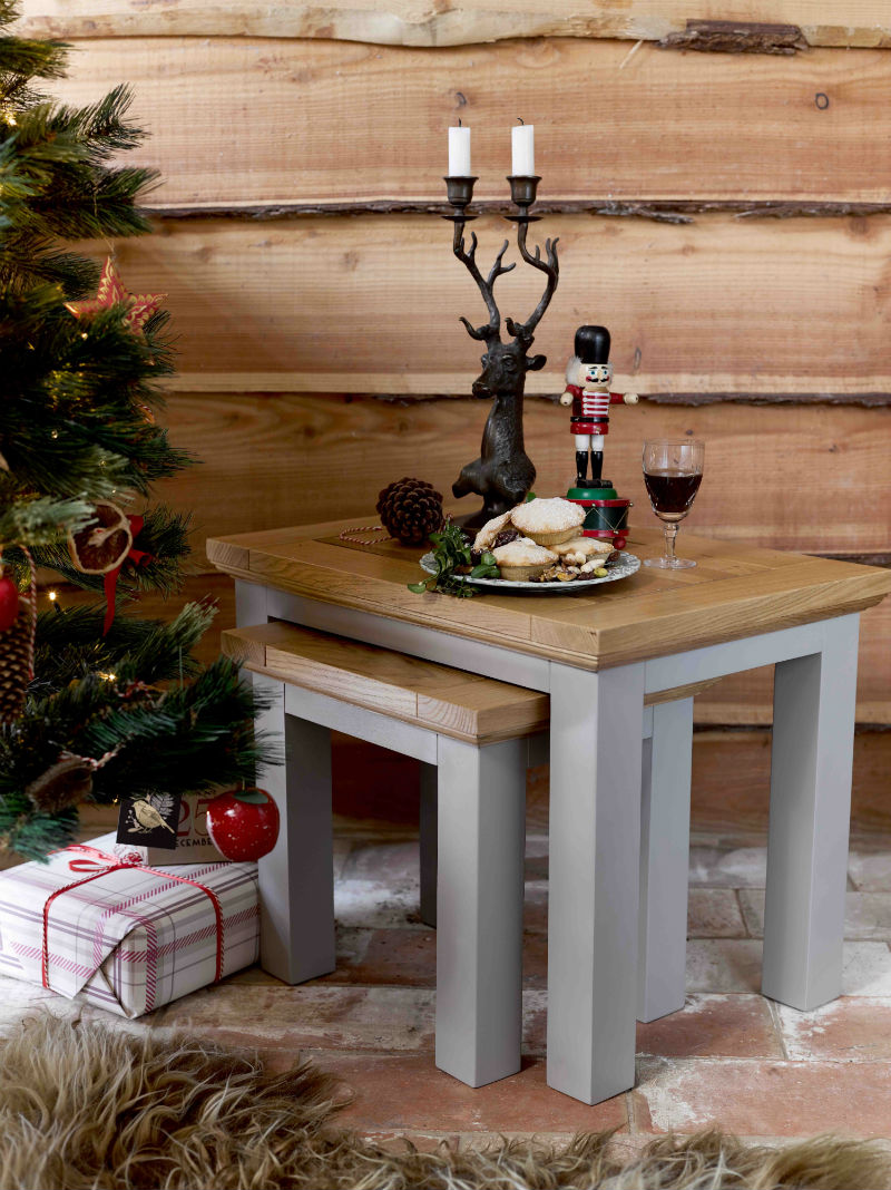 Nest of grey-painted tables with natural oak top in Christmas scene