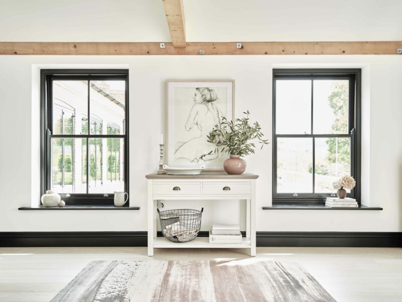 Oak Furnitureland white painted Brompton farmhouse-style console table.