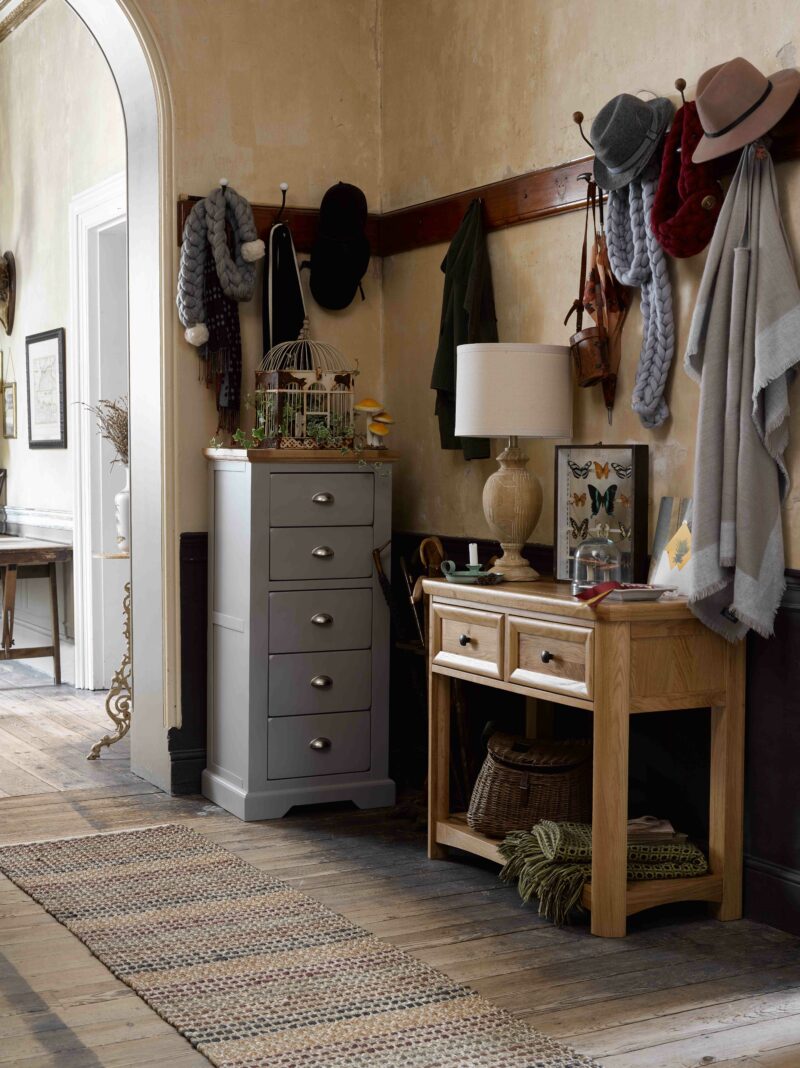 Oak Furnitureland Wiltshire console table and St. Ives tall boy in an eclectic hallway.