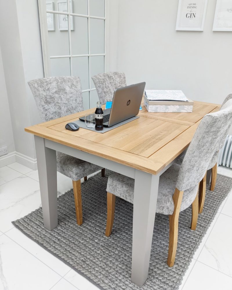 Working from home on grey dining table