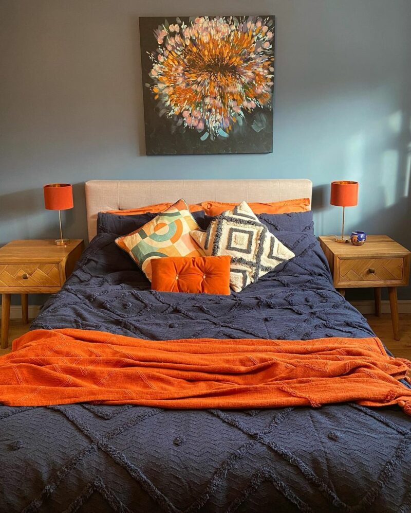 colourful modern bedroom with floral artwork