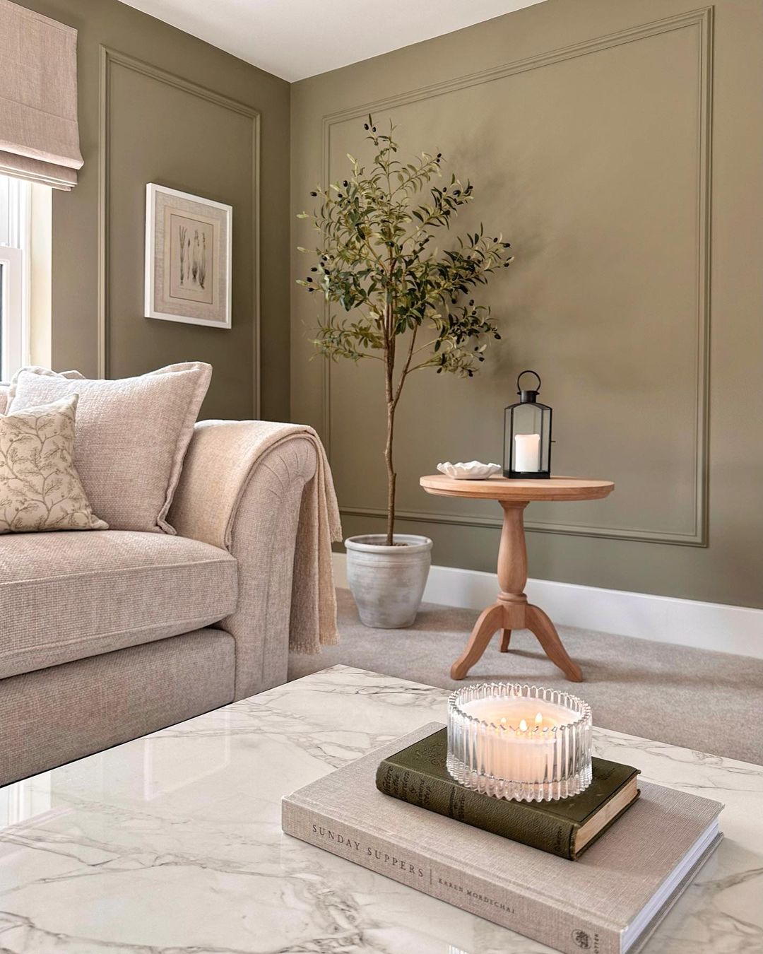 Cream Oak Furnitureland Ashby sofa in an olive green living room with neutral accents.