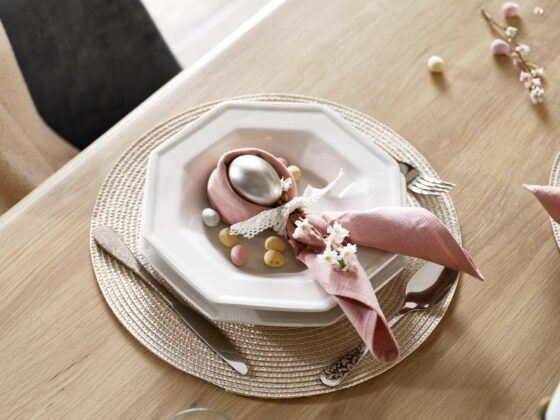 A dining table with place setting-dining furniture-wooden dining table with Easter tablescape place setting